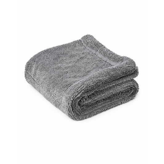Folded gray towel on a white background