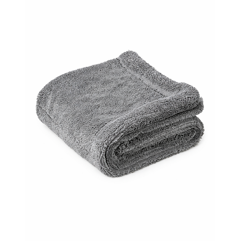 Folded gray towel on a white background